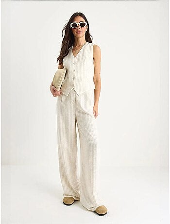 Completo due pezzi in lino con gilet a righe e pantaloni palazzo lucci