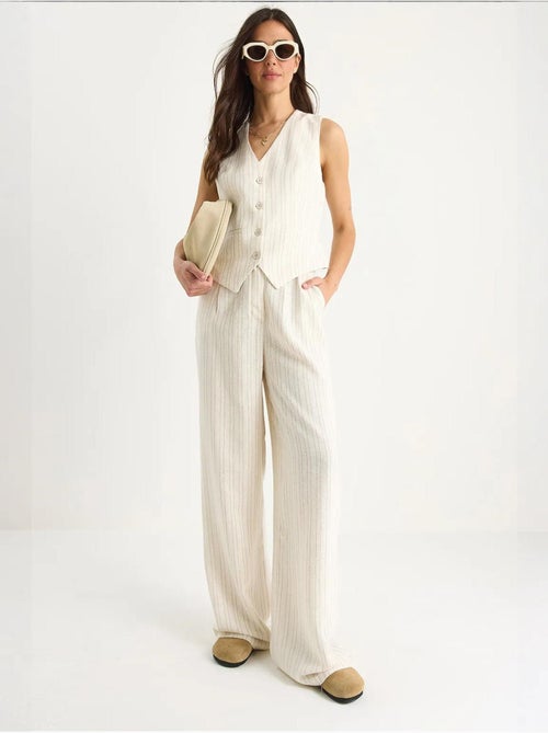 Completo due pezzi in lino con gilet a righe e pantaloni palazzo lucci - Kiabi Completo due pezzi in lino con gilet a righe e pantaloni palazzo lucci - Kiabi