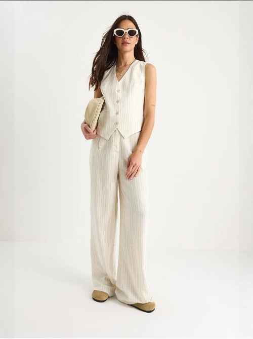 Completo due pezzi in lino con gilet a righe e pantaloni palazzo lucci - Kiabi Completo due pezzi in lino con gilet a righe e pantaloni palazzo lucci - Kiabi