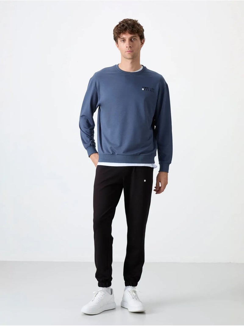 Completo felpa e pantaloni oversize girocollo tommy Blu - Kiabi