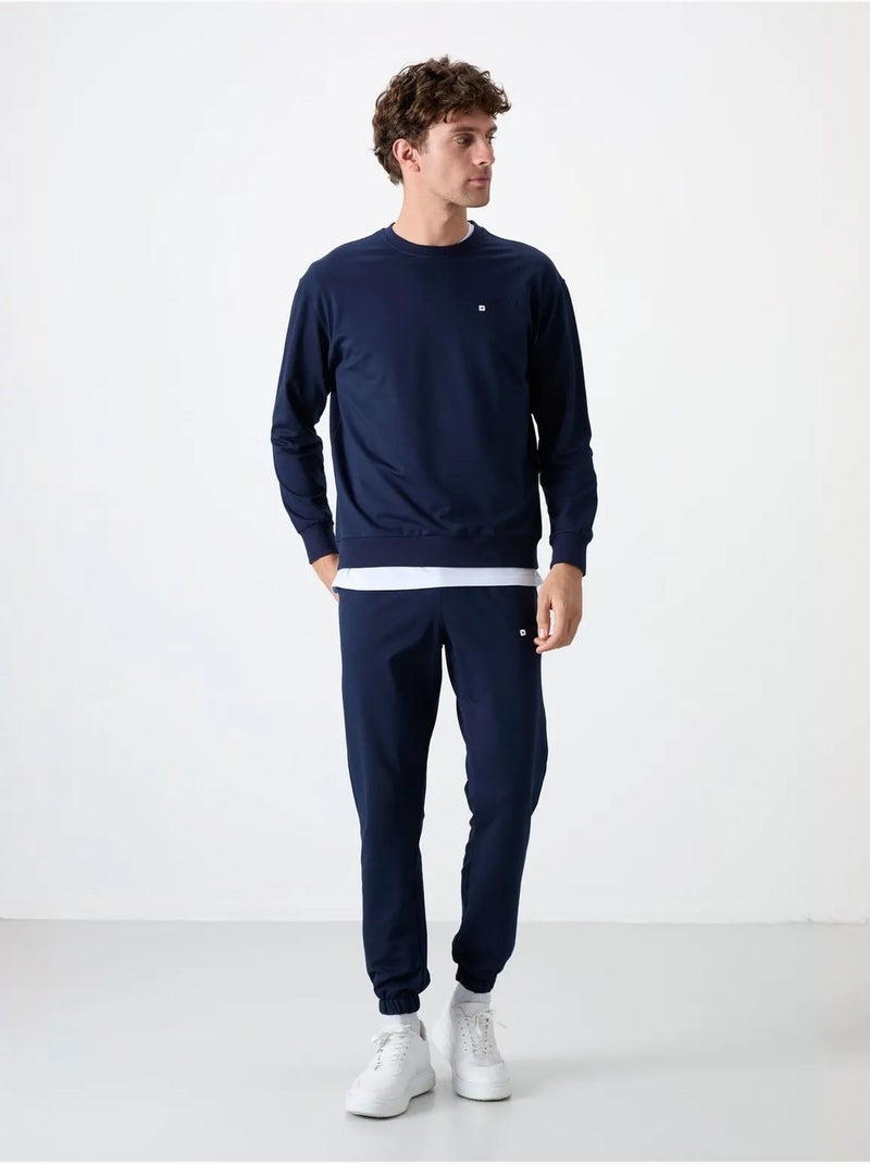 Completo felpa e pantaloni oversize girocollo tommy Blu marino - Kiabi