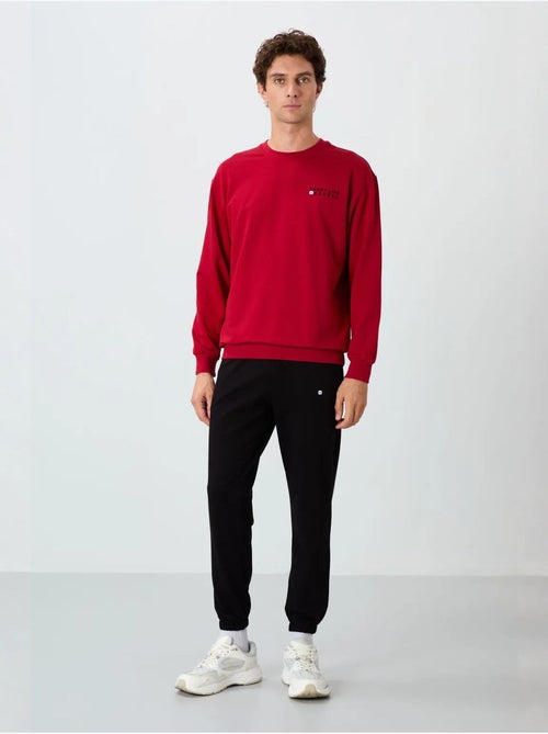 Completo felpa e pantaloni oversize girocollo tommy - Kiabi Completo felpa e pantaloni oversize girocollo tommy - Kiabi