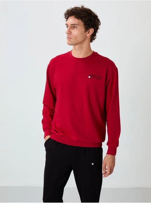 Completo felpa e pantaloni oversize girocollo tommy - Kiabi Completo felpa e pantaloni oversize girocollo tommy - Kiabi