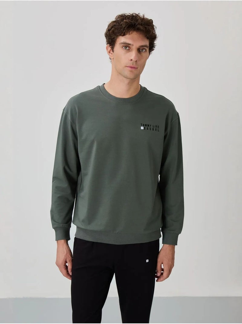 Completo felpa e pantaloni oversize girocollo tommy Verde scuro - Kiabi