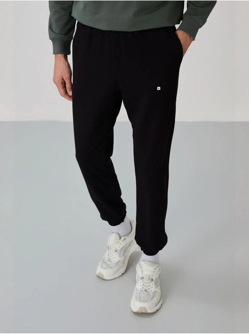 Completo felpa e pantaloni oversize girocollo tommy - Kiabi Completo felpa e pantaloni oversize girocollo tommy - Kiabi