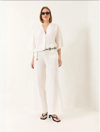 Completo pantaloni palazzo kimono in lino con maniche a pipistrello e scollo a v lucci