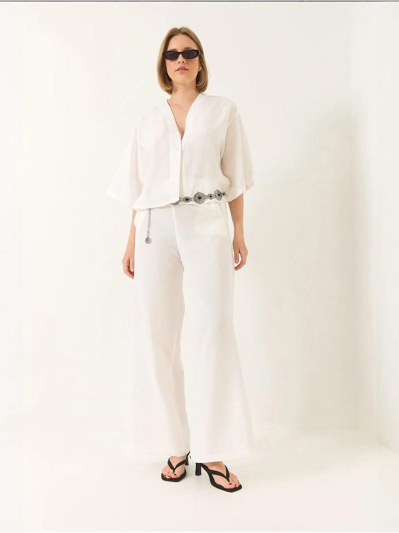 Completo pantaloni palazzo kimono in lino con maniche a pipistrello e scollo a v lucci Bianco - Kiabi
