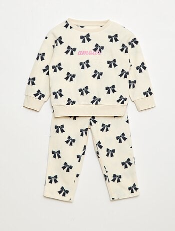 Completo pigiama top + pantaloni in pile