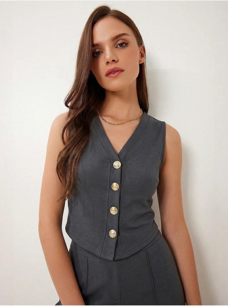 Coordinato a vita alta con scollo a v, abbottonatura e pantaloni a gamba ampia istanbul Grigio scuro - Kiabi