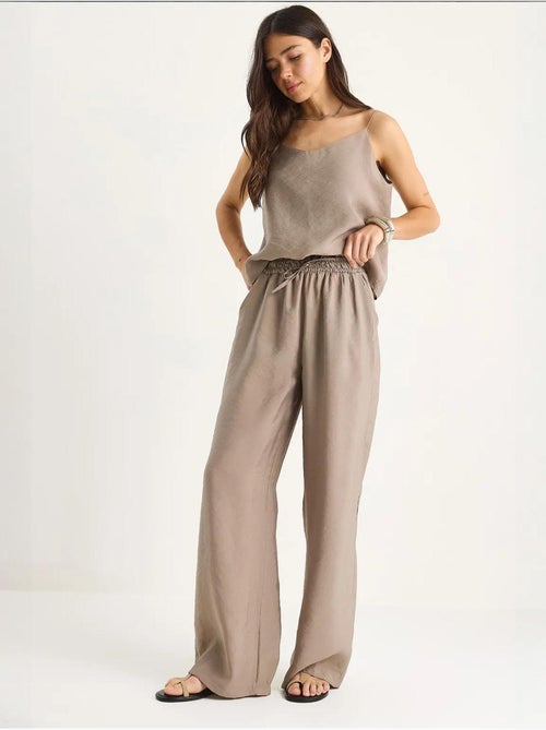 Coordinato con canotta senza maniche e pantaloni a gamba ampia lucci - Kiabi Coordinato con canotta senza maniche e pantaloni a gamba ampia lucci - Kiabi