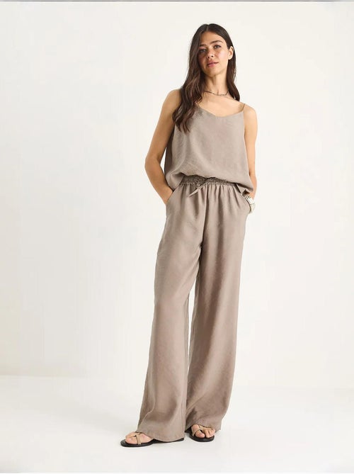 Coordinato con canotta senza maniche e pantaloni a gamba ampia lucci - Kiabi Coordinato con canotta senza maniche e pantaloni a gamba ampia lucci - Kiabi