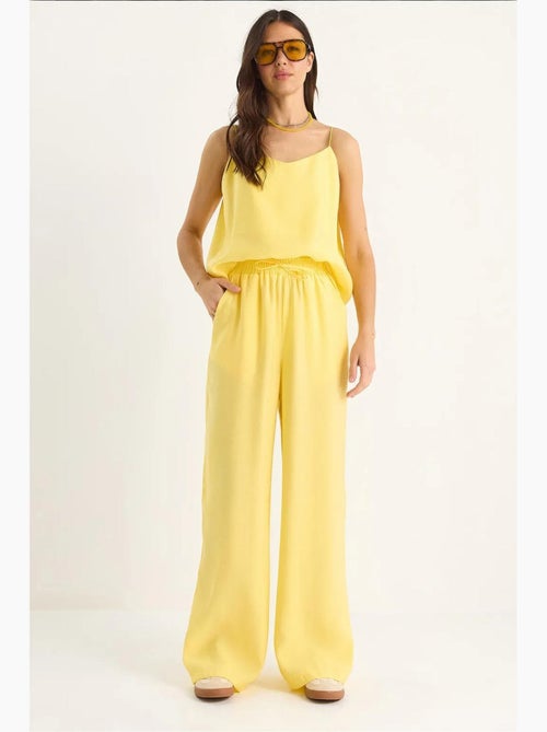 Coordinato con canotta senza maniche e pantaloni a gamba ampia lucci - Kiabi Coordinato con canotta senza maniche e pantaloni a gamba ampia lucci - Kiabi
