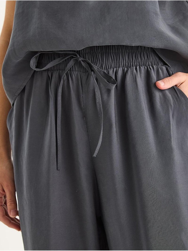 Coordinato con canotta senza maniche e pantaloni a gamba ampia lucci Grigio medio - Kiabi