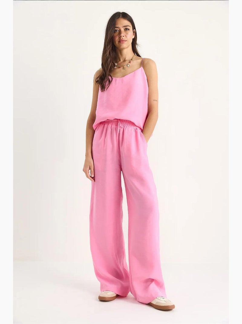Coordinato con canotta senza maniche e pantaloni a gamba ampia lucci Rosa fluo/Solinotes - Kiabi