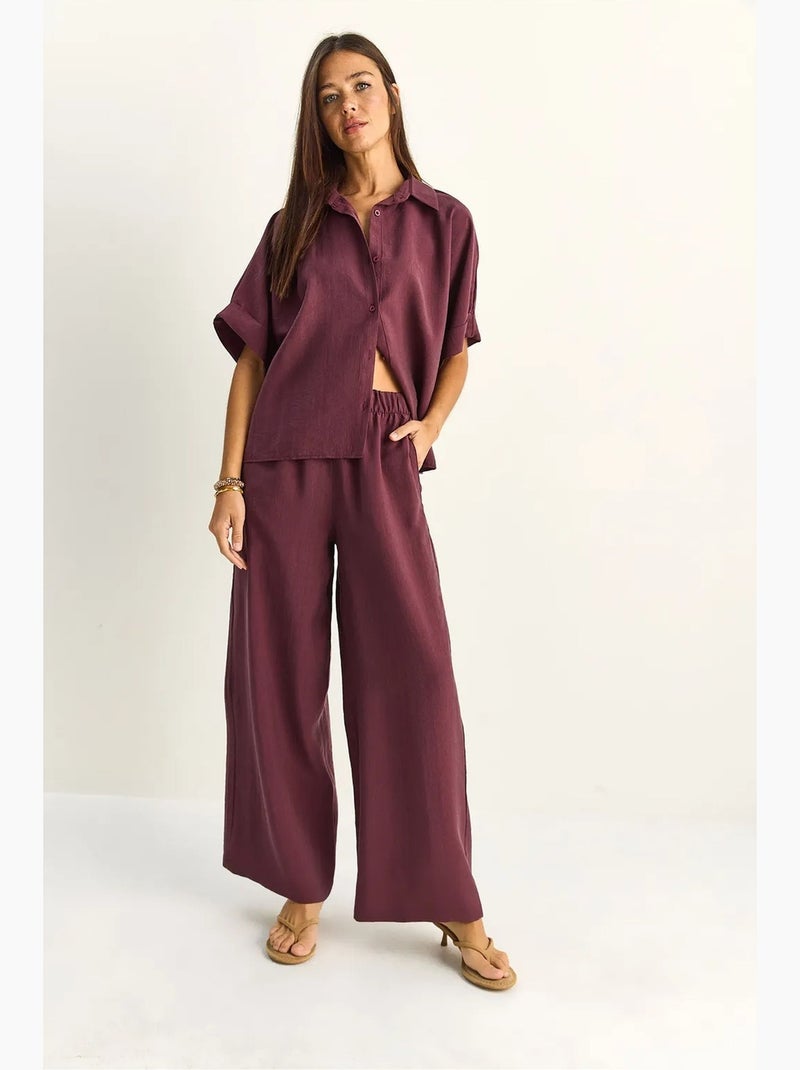 Coordinato due pezzi a gamba larga a vita alta con collo a camicia lucci Malva - Kiabi