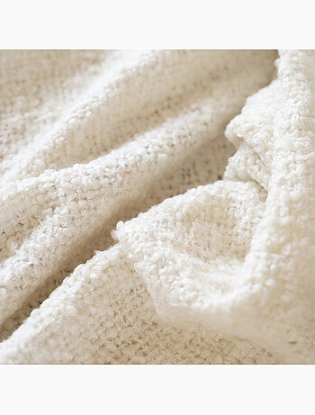 Coperta in morbida spugna con frange