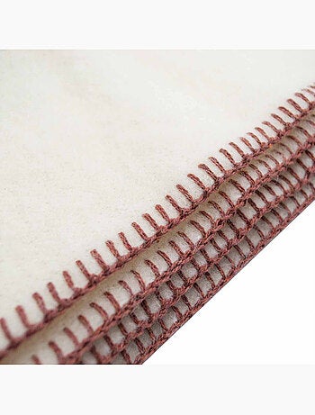 Coperta in pura lana vergine con finitura a punto cavallo