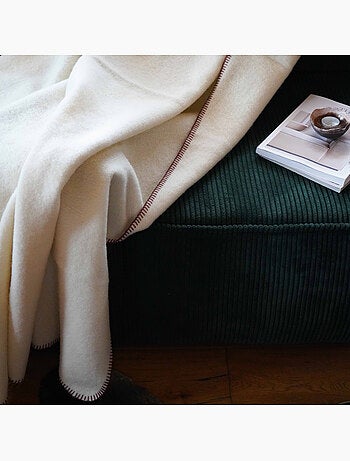 Coperta in pura lana vergine con finitura a punto cavallo
