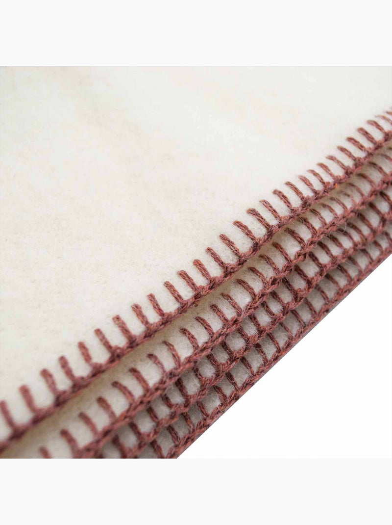 Coperta in pura lana vergine con finitura a punto cavallo Bordeaux - Kiabi