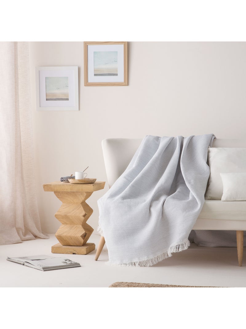 Coperta tipo Plaid, tessuto strutturato in filato tinto a rilievo a nido d'ape, con frange - Gamusi Grigio chiaro - Kiabi