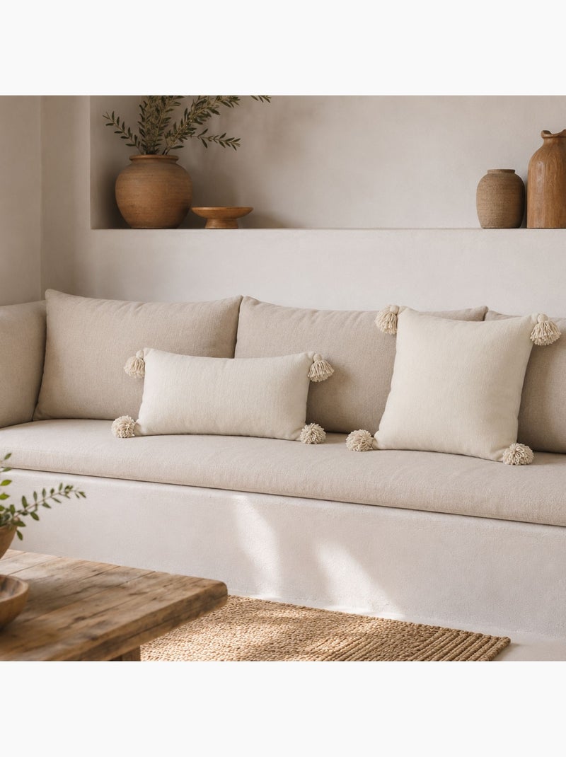 Copricuscino in lana con nappe Crema - Kiabi