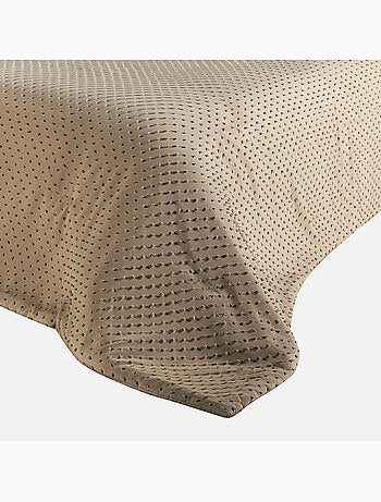 Copriletto con piccole nappe