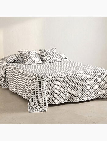 Copriletto in cotone con design geometrico in rilievo, tessuto testurizzato.