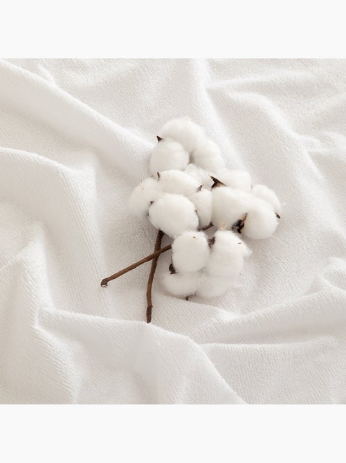 Coprimaterasso impermeabile in spugna per culla, 100% cotone, elasticizzato - Gamusi. - Kiabi