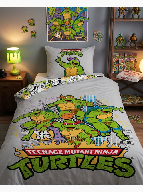 Copripiumino Tartarughe Ninja TMNT 140x200cm + Federa 65x65cm – 4 Tartarughe New York – Policotone – - Kiabi Copripiumino Tartarughe Ninja TMNT 140x200cm + Federa 65x65cm – 4 Tartarughe New York – Policotone – - Kiabi