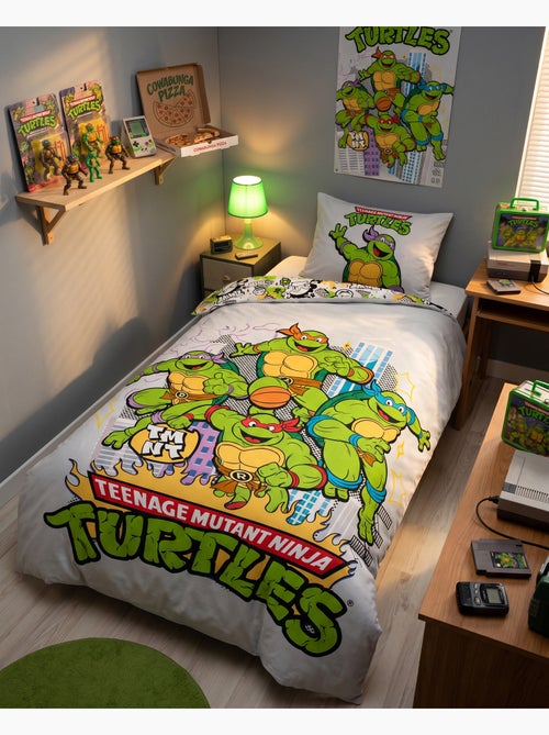 Copripiumino Tartarughe Ninja TMNT 140x200cm + Federa 65x65cm – 4 Tartarughe New York – Policotone – - Kiabi Copripiumino Tartarughe Ninja TMNT 140x200cm + Federa 65x65cm – 4 Tartarughe New York – Policotone – - Kiabi