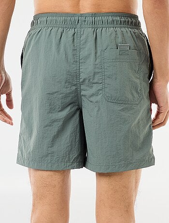 Costume da bagno con ampie tasche