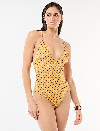 Costume da bagno intero con scollatura profonda e dettaglio gioiello