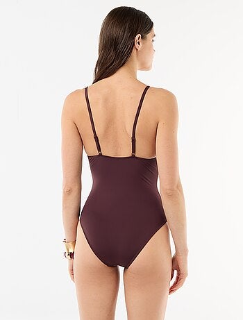 Costume da bagno intero con scollatura profonda e dettaglio gioiello
