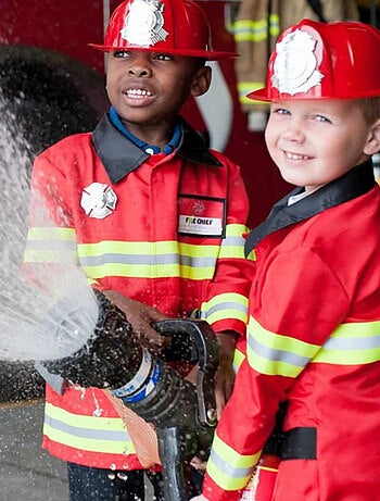 Costume pompiere con accessori per bambini | Great Pretenders