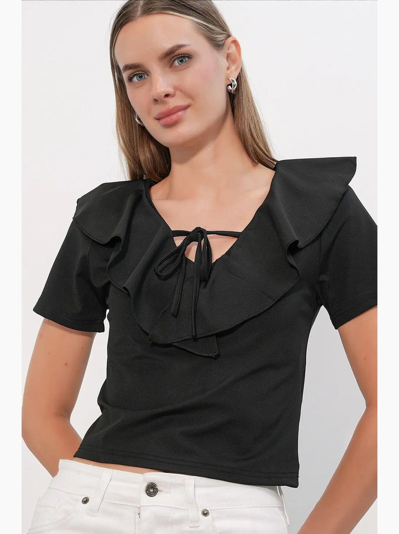 Crop top con ruches e chiusura frontale con laccetto bdart Nero - Kiabi