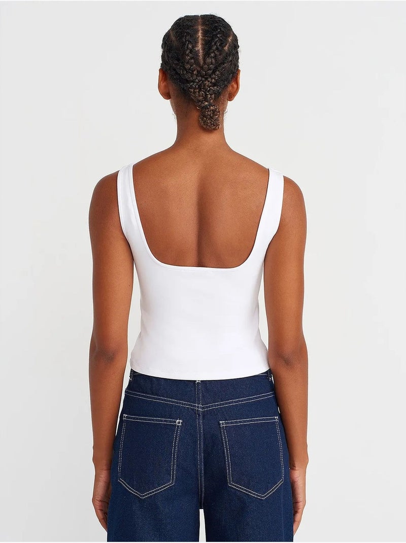 Crop top con scollo quadrato senza maniche dilvin Bianco - Kiabi