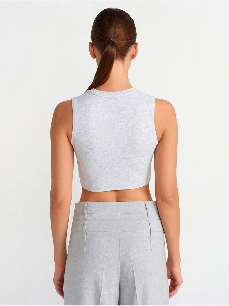 Crop top in cotone a coste dilvin Grigio chiaro - Kiabi