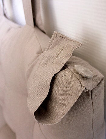 Cuscino per testiera in cotone con linguette a bottone