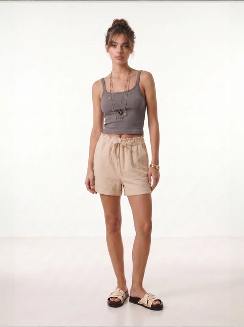 Deliziosi mini shorts a vita alta con coulisse e dettaglio di rilegatura istanbul - Kiabi Deliziosi mini shorts a vita alta con coulisse e dettaglio di rilegatura istanbul - Kiabi