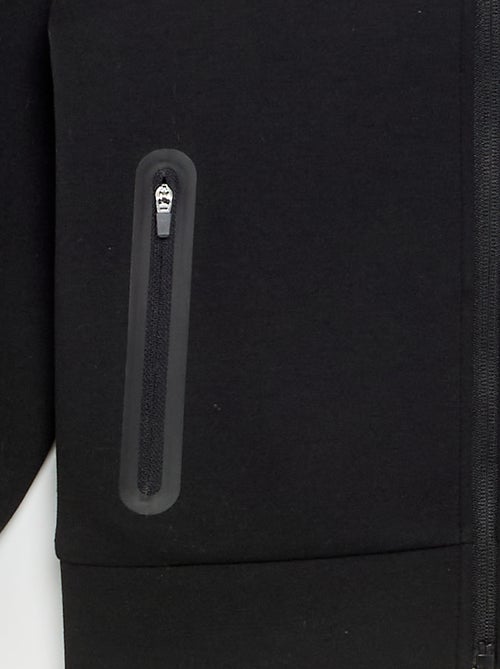 Felpa con cappuccio e cerniera con 2 tasche con zip - Kiabi Felpa con cappuccio e cerniera con 2 tasche con zip - Kiabi