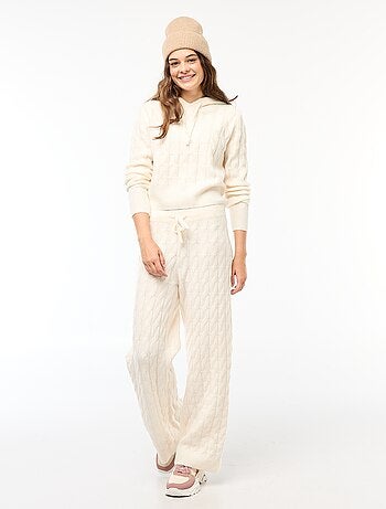 Maglione con cappuccio e trecce