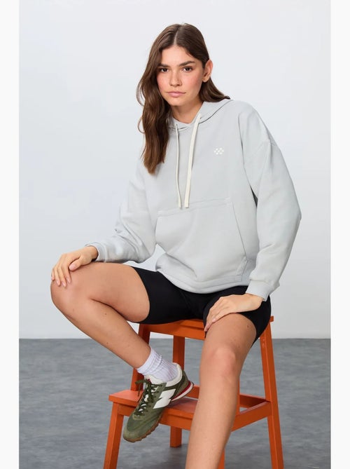Felpa con cappuccio oversize e tasca tommy - Kiabi Felpa con cappuccio oversize e tasca tommy - Kiabi