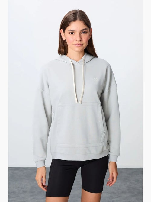 Felpa con cappuccio oversize e tasca tommy - Kiabi Felpa con cappuccio oversize e tasca tommy - Kiabi