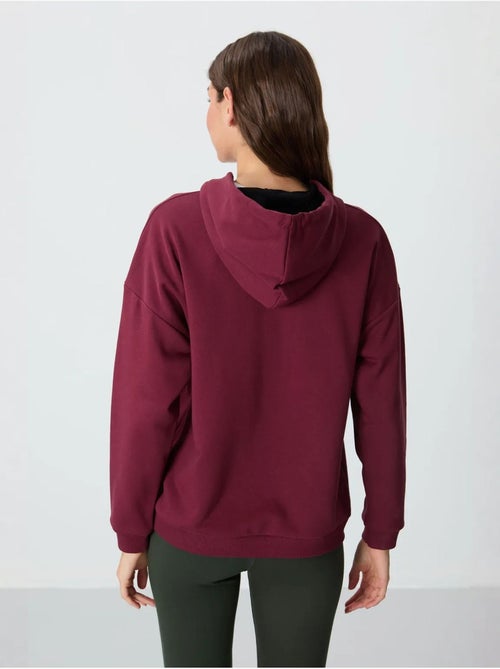 Felpa con cappuccio oversize e tasca tommy - Kiabi Felpa con cappuccio oversize e tasca tommy - Kiabi