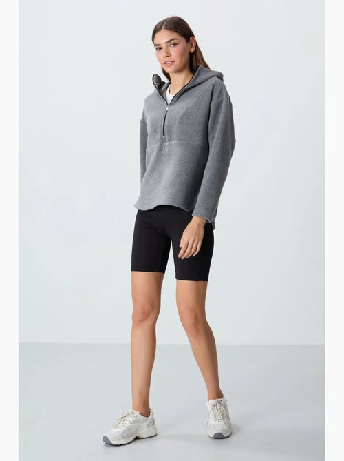 Felpa con cappuccio oversize in peluche con mezza zip tommy - Kiabi Felpa con cappuccio oversize in peluche con mezza zip tommy - Kiabi