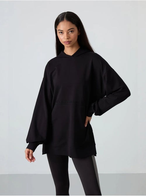 Felpa con cappuccio oversize stampata tommy - Kiabi Felpa con cappuccio oversize stampata tommy - Kiabi