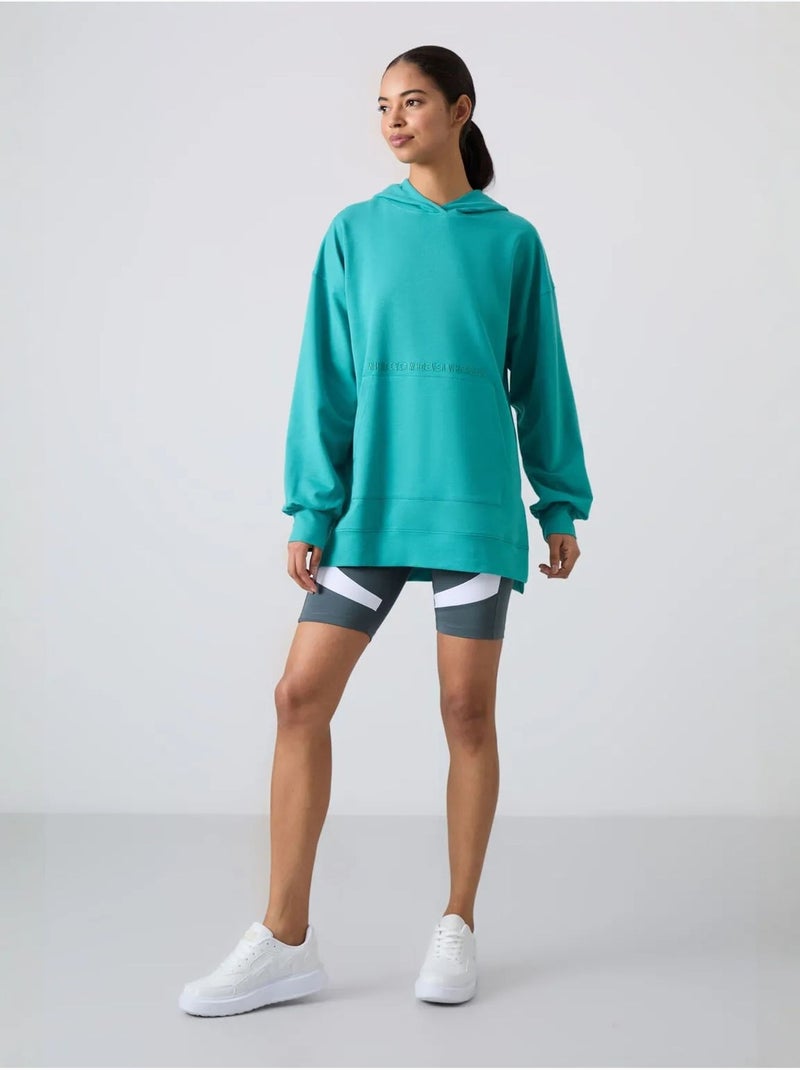 Felpa con cappuccio oversize stampata tommy Verde menta - Kiabi