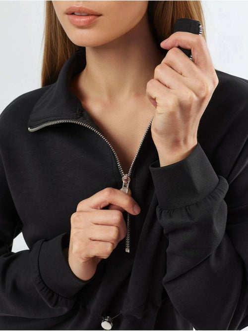 Felpa con collo con zip e vita regolabile busem - Kiabi Felpa con collo con zip e vita regolabile busem - Kiabi