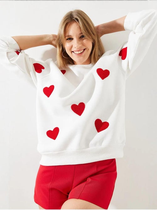 Felpa con cuore ricamato lucci - Kiabi Felpa con cuore ricamato lucci - Kiabi