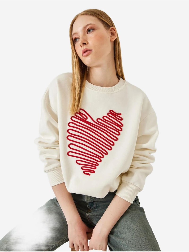Felpa con ricamo a cuore lucci Bianco - Kiabi